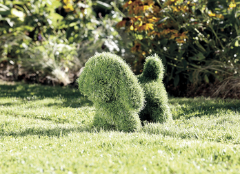 Figura decorativa de jardín em grama artificial - Cachorro sentado